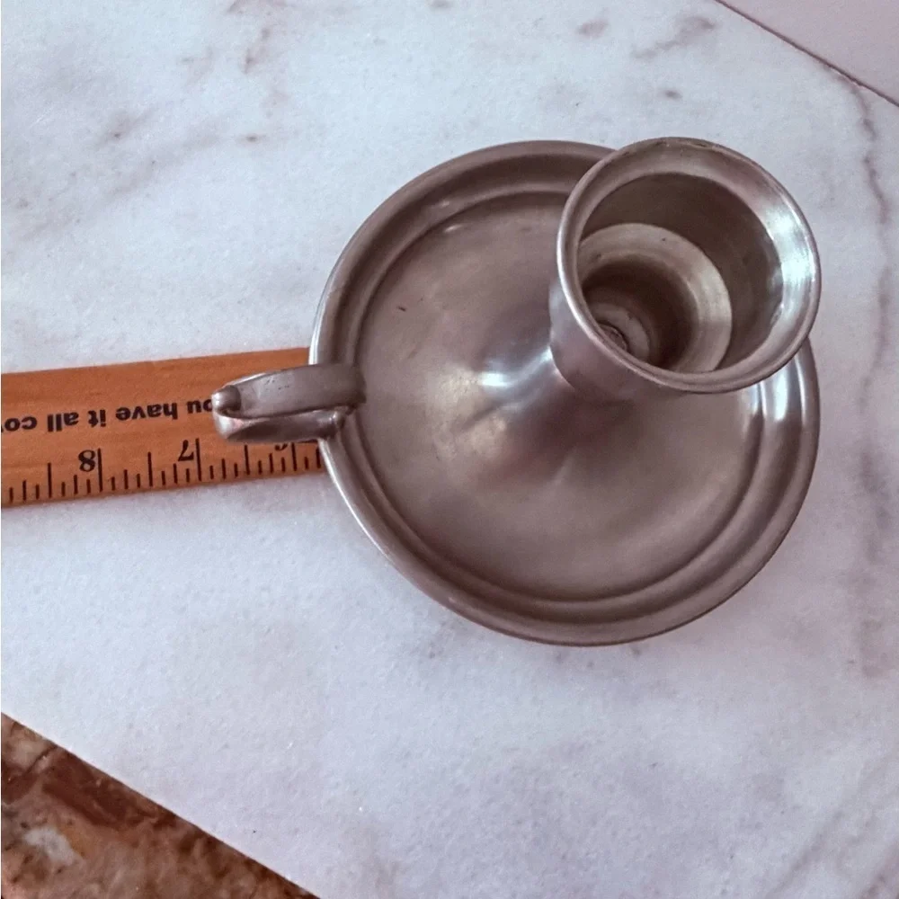 an Early American Pewter by Web chamberstick candle holder